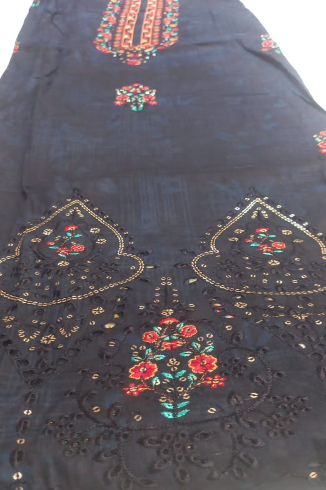 AlZohaib untitched blue fabric with intricate gold, red, and green embroidery on a white background