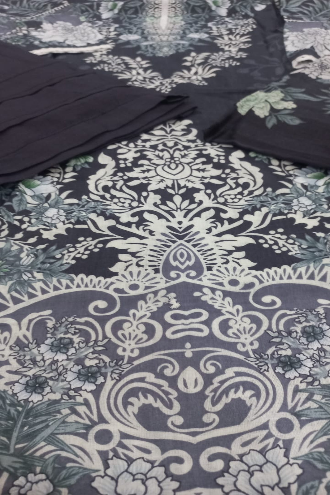 "Ishaal Black Unstitched Suit - Sabina's Designer Hub"
To add the alt text: