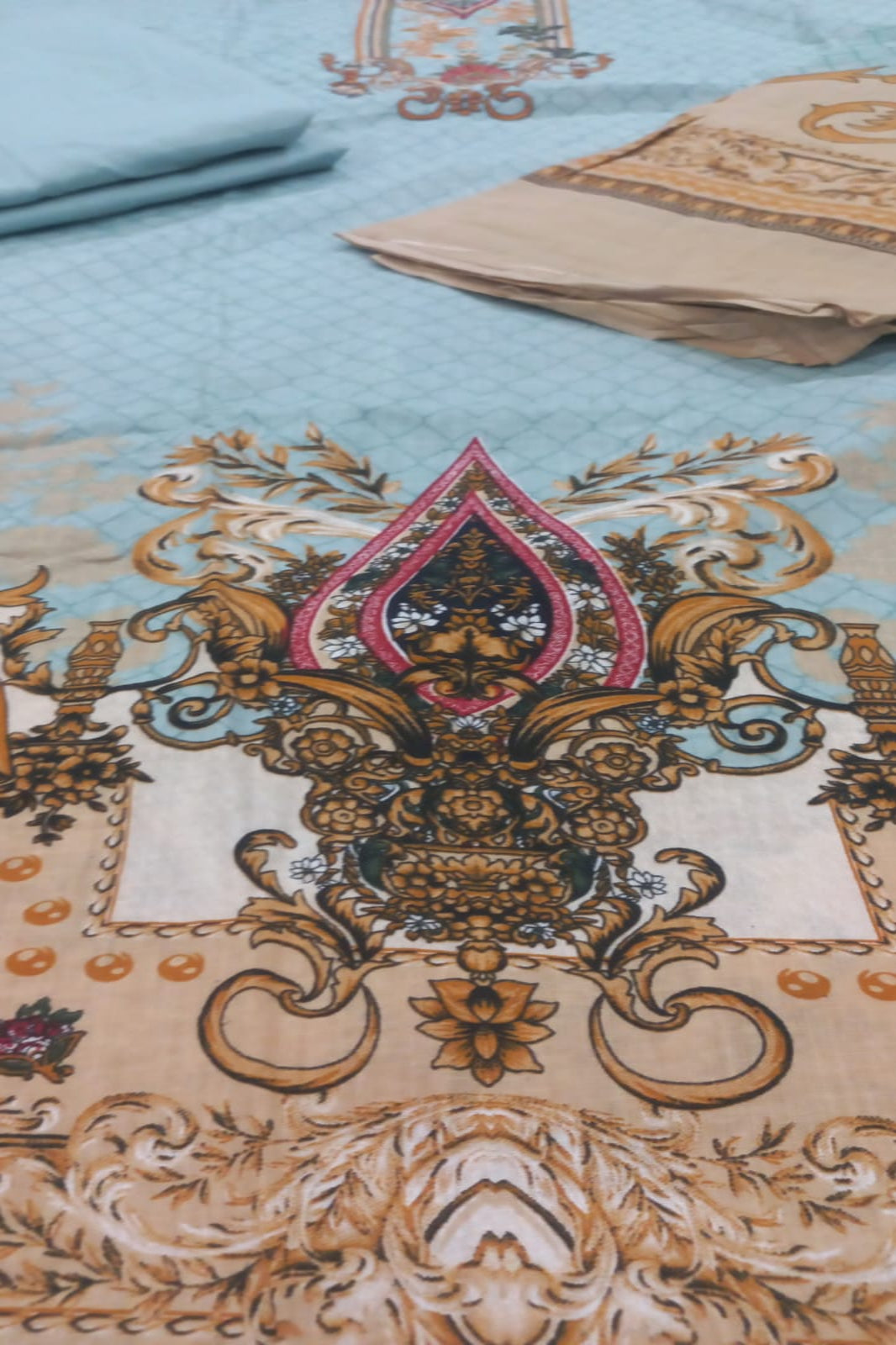  Firdous light blue cotton suit close-up view showing embroidery detail and fabric texture