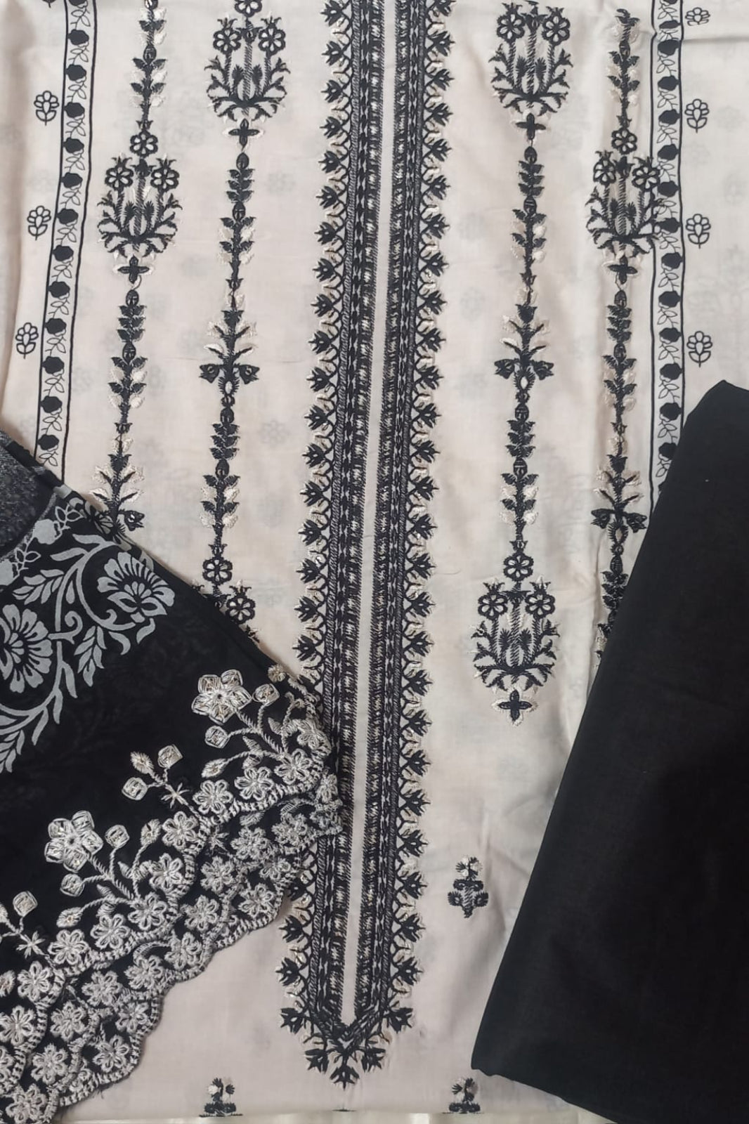 White and black cotton lawn unstitched suit with self-embroidery 