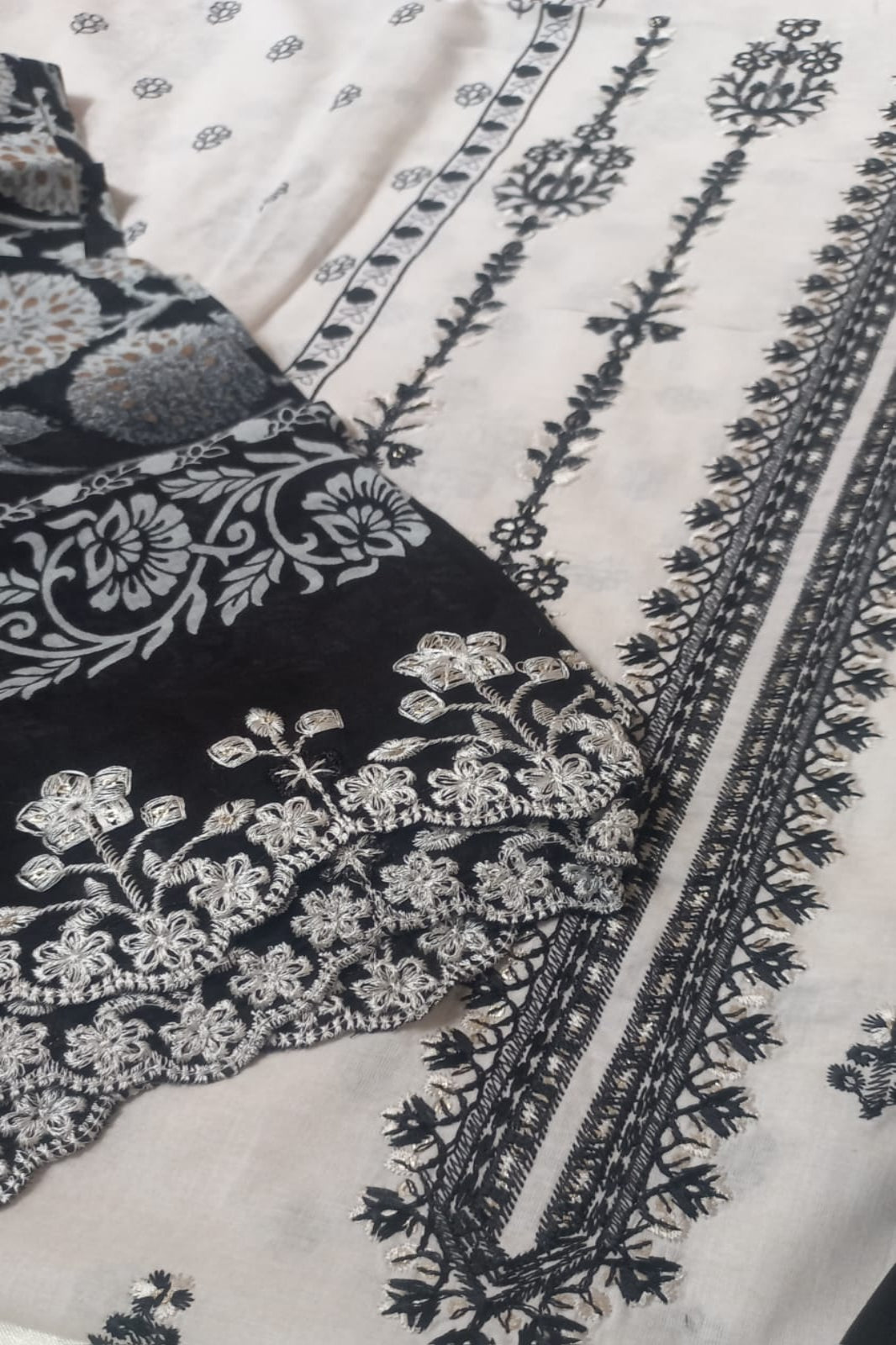 White and black cotton lawn unstitched suit with self-embroidery 