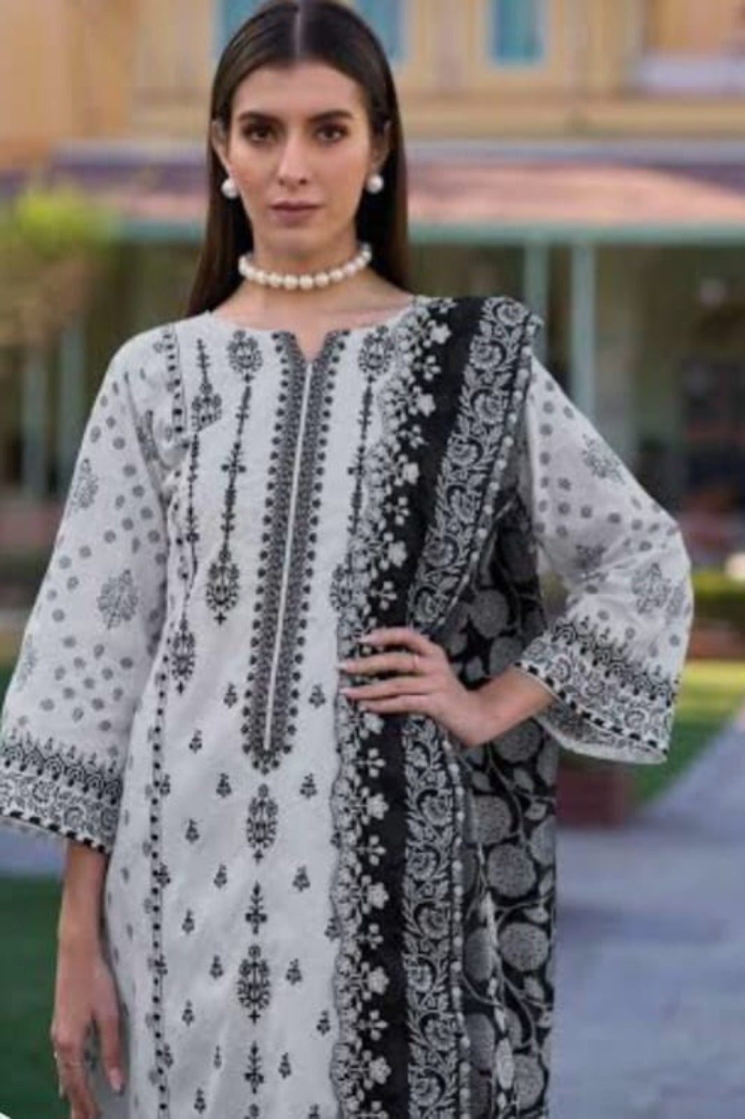 White and black cotton lawn unstitched suit with self-embroidery 

